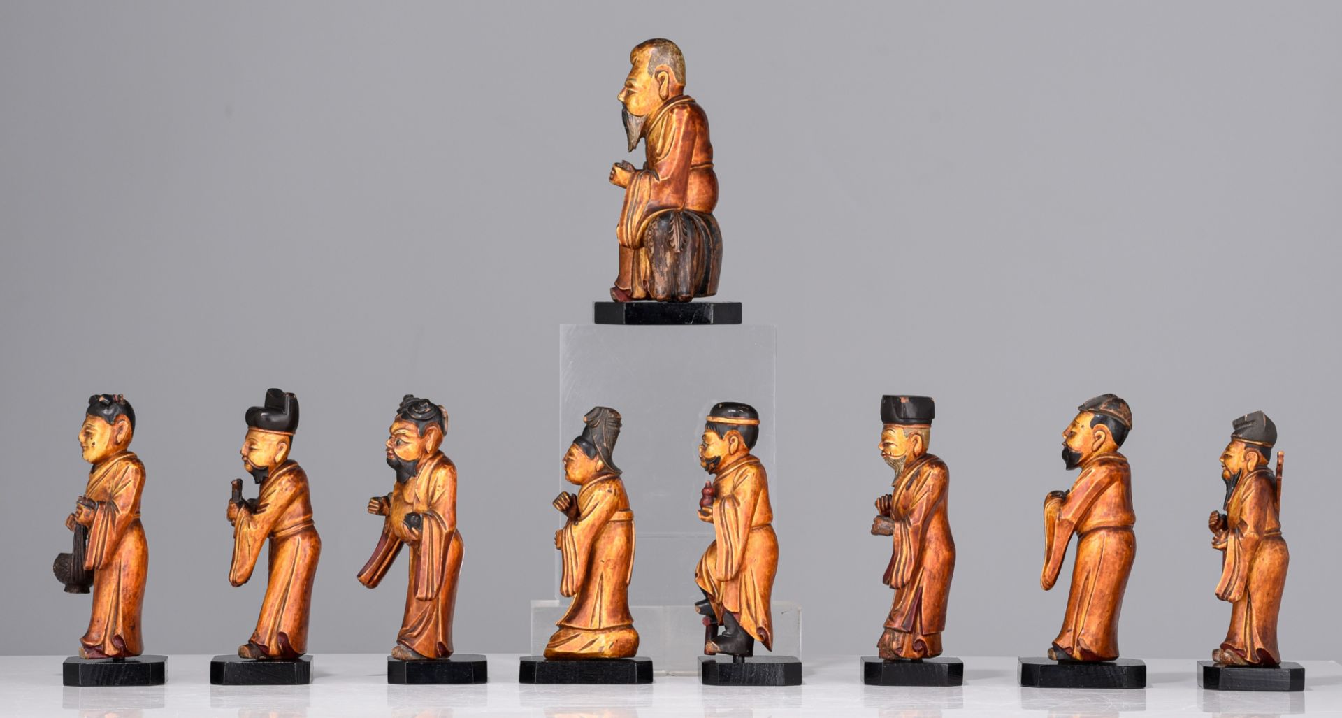 A set of nine Chinese gilt lacquered figures of the Eight Immortals and Shou Lou, 19thC, tallest H 1 - Image 3 of 9