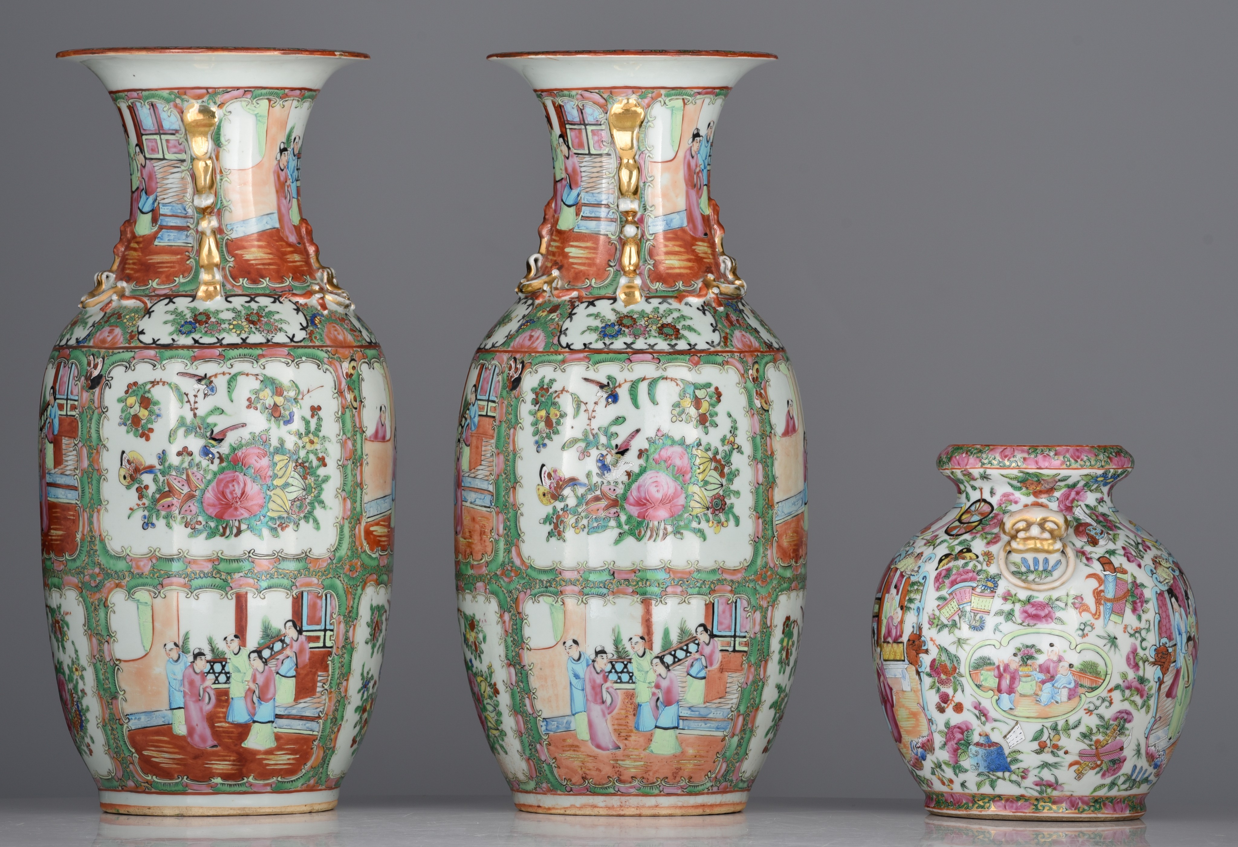 A similar pair of Chinese Canton famille rose vases, 19thC, H 44,5 cm - added a Chinese Canton pomeg - Image 3 of 7