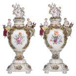 A large pair of Rococo-inspired Saxony porcelain vases and covers on stands, H 75,5 cm