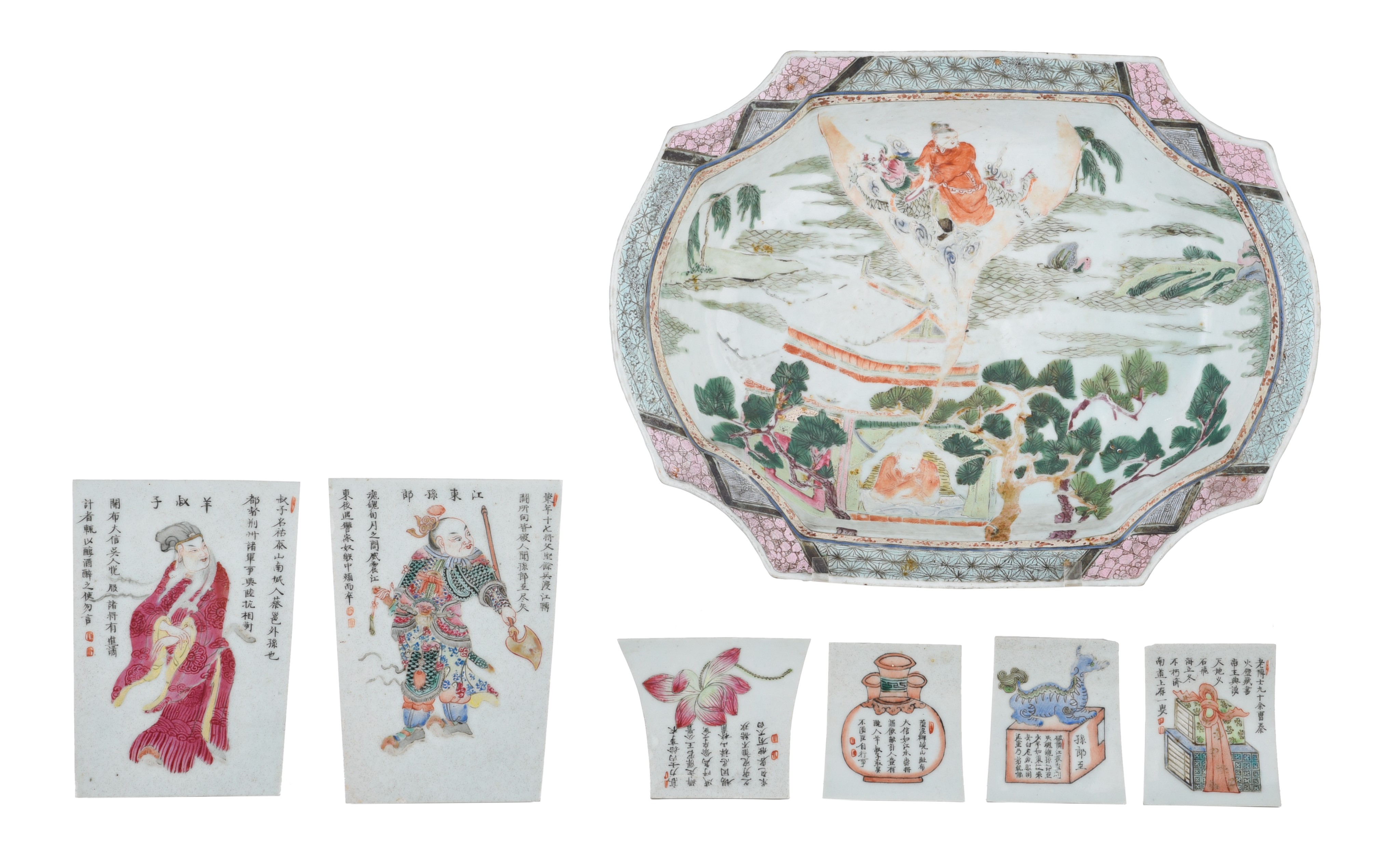 A Chinese famille rose deep plate, late 18thC, 33 x 25,4 - H 7 cm - added six porcelain cuts depicti