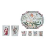A Chinese famille rose deep plate, late 18thC, 33 x 25,4 - H 7 cm - added six porcelain cuts depicti