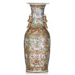 A fine and imposing Chinese Canton famille rose vase, paired with Fu lion handles, 19thC, H 92 cm