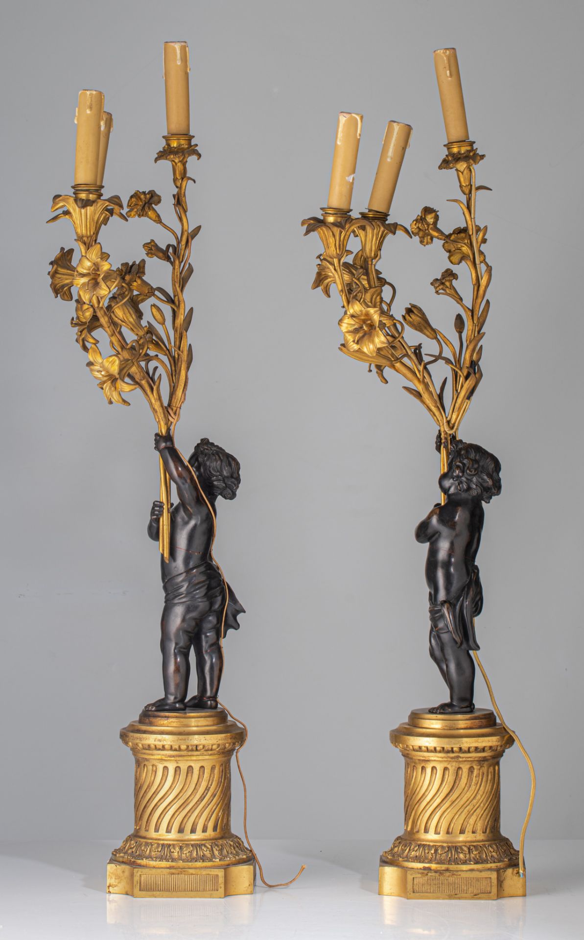 A pair of Neoclassical patinated and gilt bronze figural candelabras, H 80 cm - Image 3 of 7