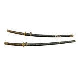 A set of two Japanese samurai katana, the smaller one with engraved nakago, late Meiji or interwar p