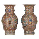 A pair of Chinese famille rose 'One Hundred Treasures' vases, 19thC, H 36 cm