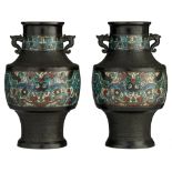 A pair of Japanese archaistic champleve enamelled bronze hu vases, 20thC, H 36 cm