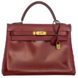 HERMeS, Kelly Retourne 32 bag, Rouge H box calf leather, with gilt metal hardware