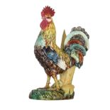 An Art Nouveau polychrome faience standing rooster by Delphine Massier (1836-1907), Vallauris, H 33