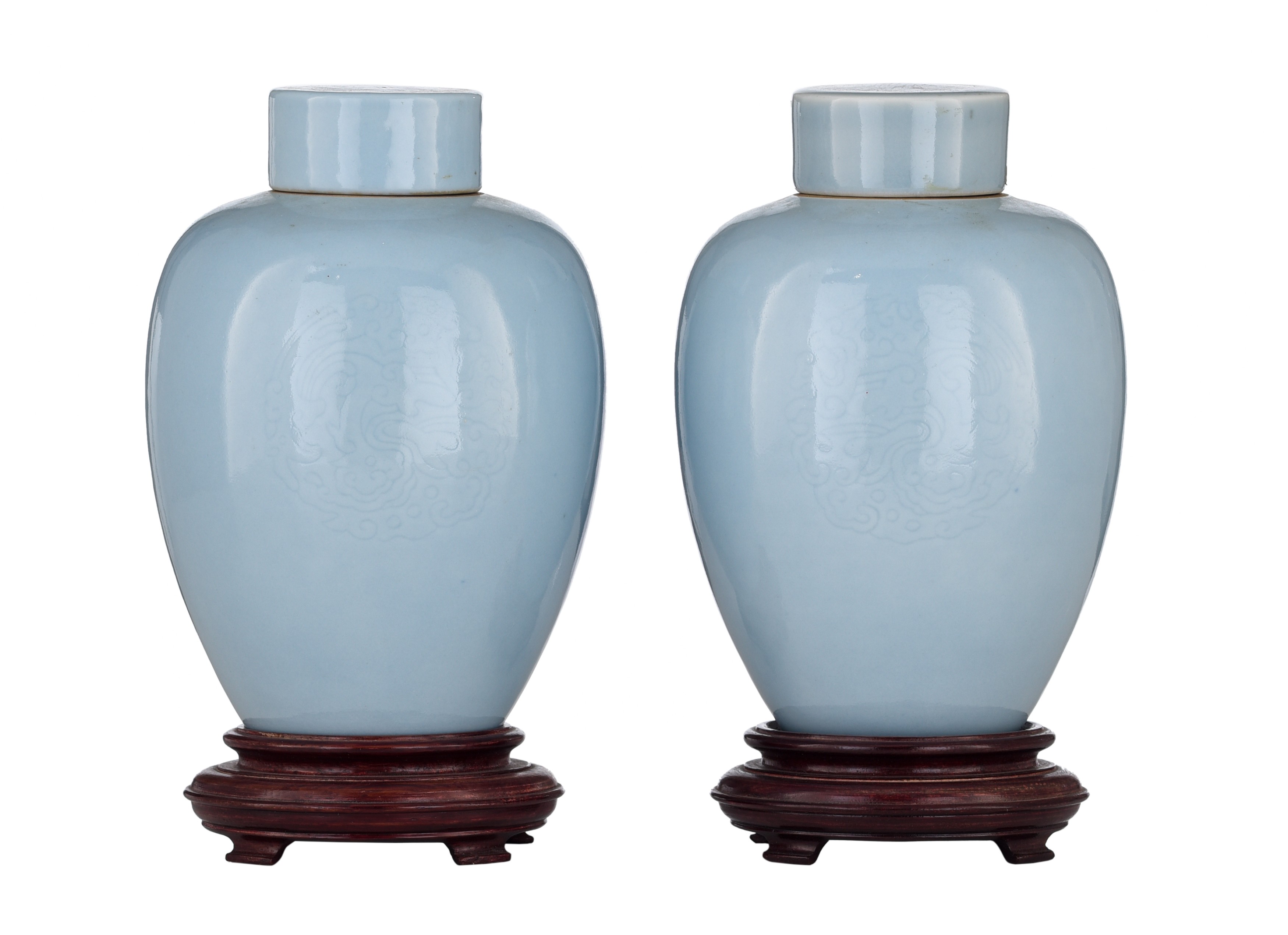 A series of two Chinese incised claire-de-lune glazed tea caddies and lids, with a Kangxi mark, H 17