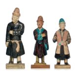 A collection of Chinese fahua or sancai glazed pottery figures, Ming dynasty, tallest H 33,5 cm (+)