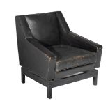 A Verraneman armchair, black leather on a black lacquered wooden frame, 1957, H 76 - W 72 cm