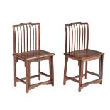 A pair of Chinese hardwood spindle back chairs, Republic period, H 92 - W 48,5 - D 37,5 cm