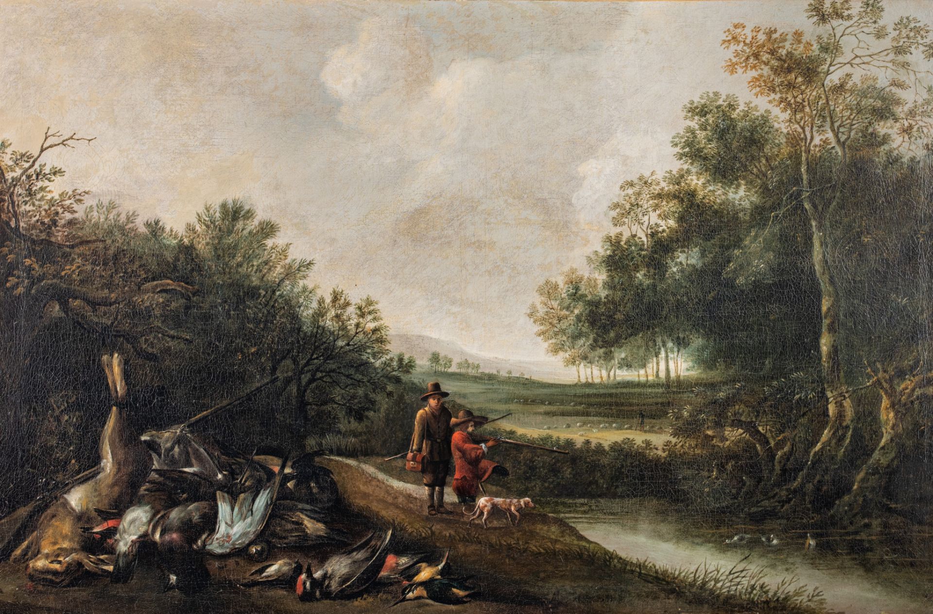 Hunters in a landscape with their hunting trophy, the Netherlands, 17thC, oil on canvas, 66 x 100 cm