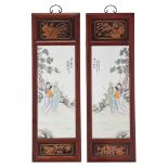 A pair of Chinese famille rose plaques, with a signed text, 20thC, 30,7 x 94,8 cm