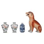 A Chinese iron-red model of a hound, two miniature vases, and a blue and white snuff bottle, 18thC -