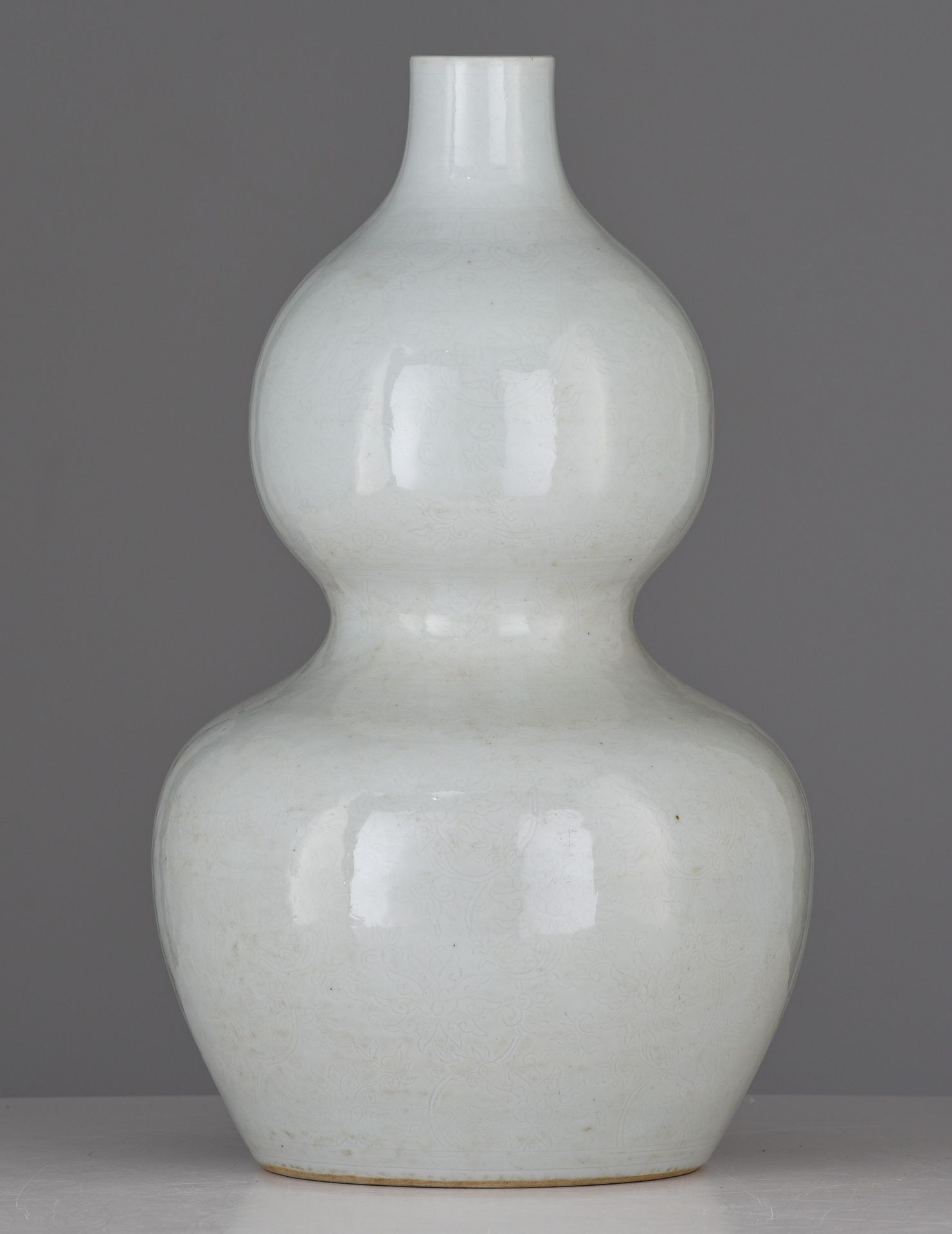 A Chinese anhua tianbai-glazed double-gourd vase, incised with 'Da Ming Wanli Nian Zhi' at the botto - Image 2 of 7