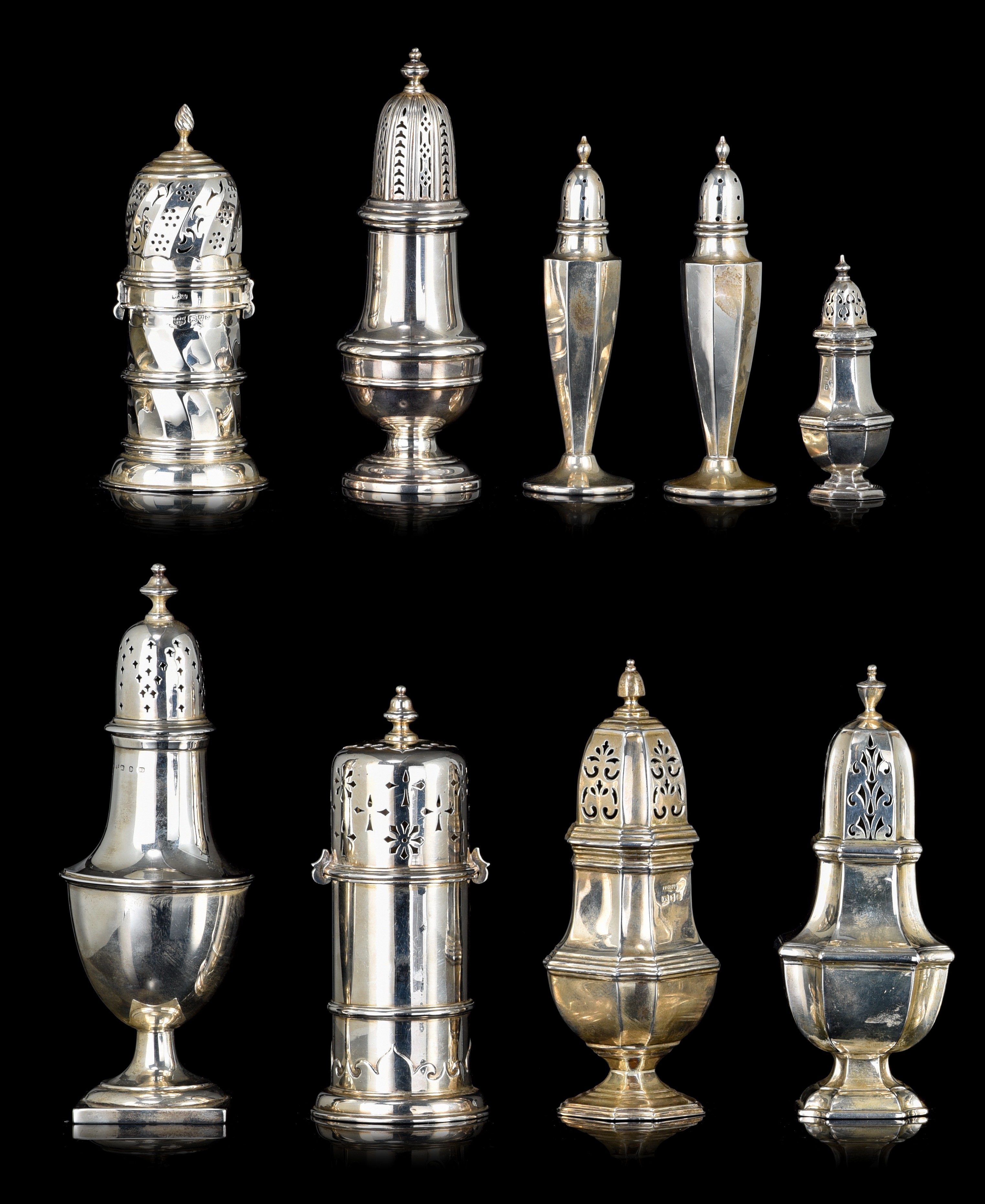 A collection of silver casters and salt shakers, H 10 - 21,5 cm, total weight: ca 1308 g