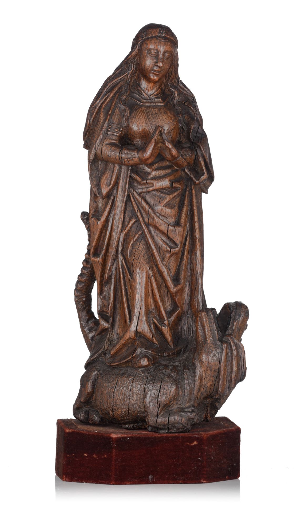 A fine oak sculpture of Saint Margaret and the dragon, 16thC, the Southern Netherlands, H 61 cm