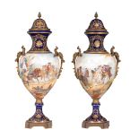 A pair of Sevres type vases, with hand-painted 17thC battle scenes, H 73 cm