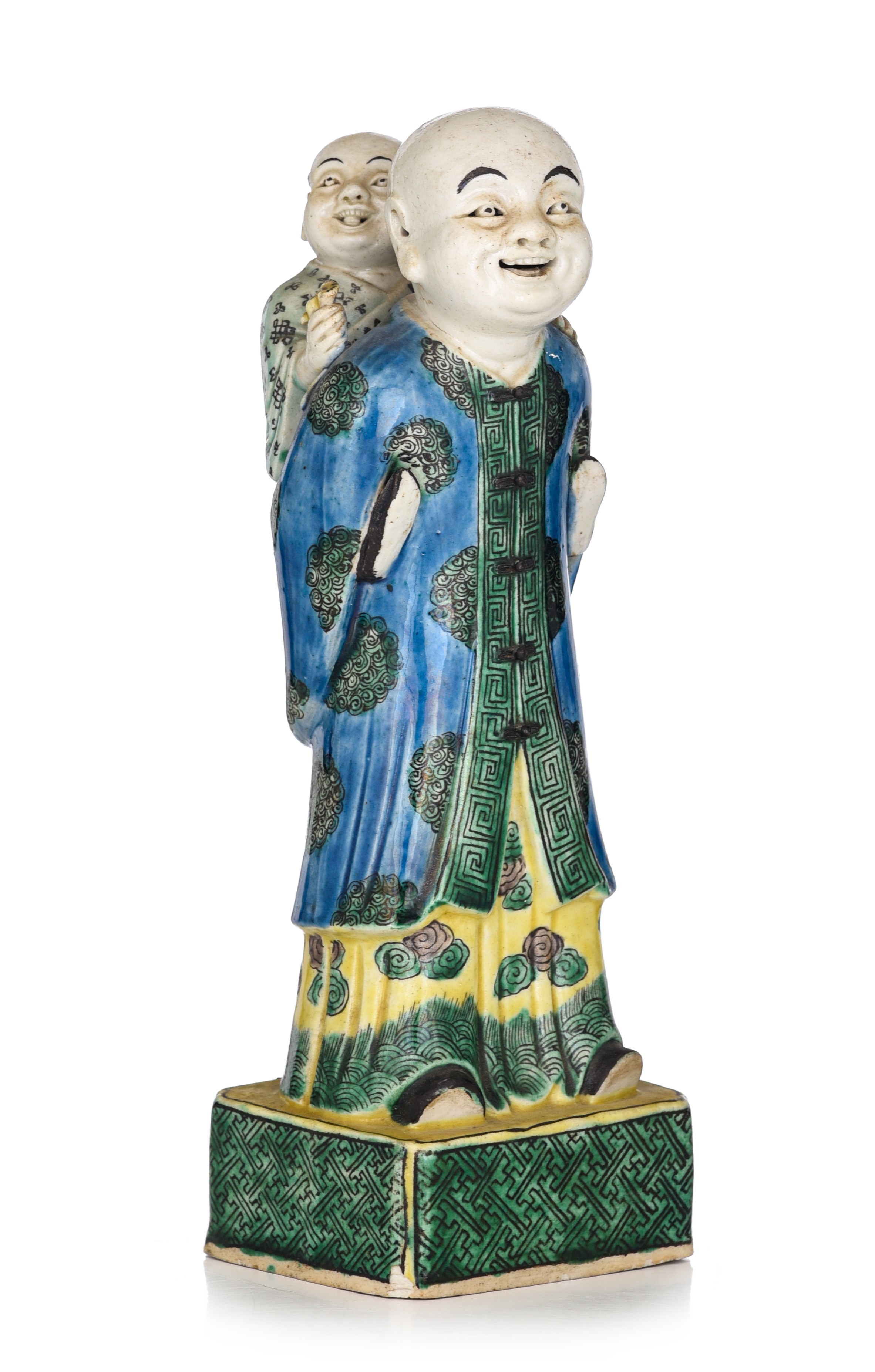 A Chinese famille verte biscuit figure of a man and boy, Republic period, H 22 cm