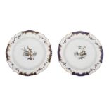 A pair of Hague-decorated Tournai porcelain circular dishes, ca. 1765, dia 31 cm