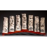 A collection of Japanese carved bone figures, depicting the Seven Immortals, H cm