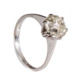 An 18ct white gold solitaire ring set with a cushion cut diamond, about 1,5ct