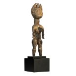 A carved and patinated wooden ritual figure, Abron (Ghana), 29,5 cm