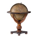 A French mid 19thC table globe, on a mahogany veneered foot, H 42 cm