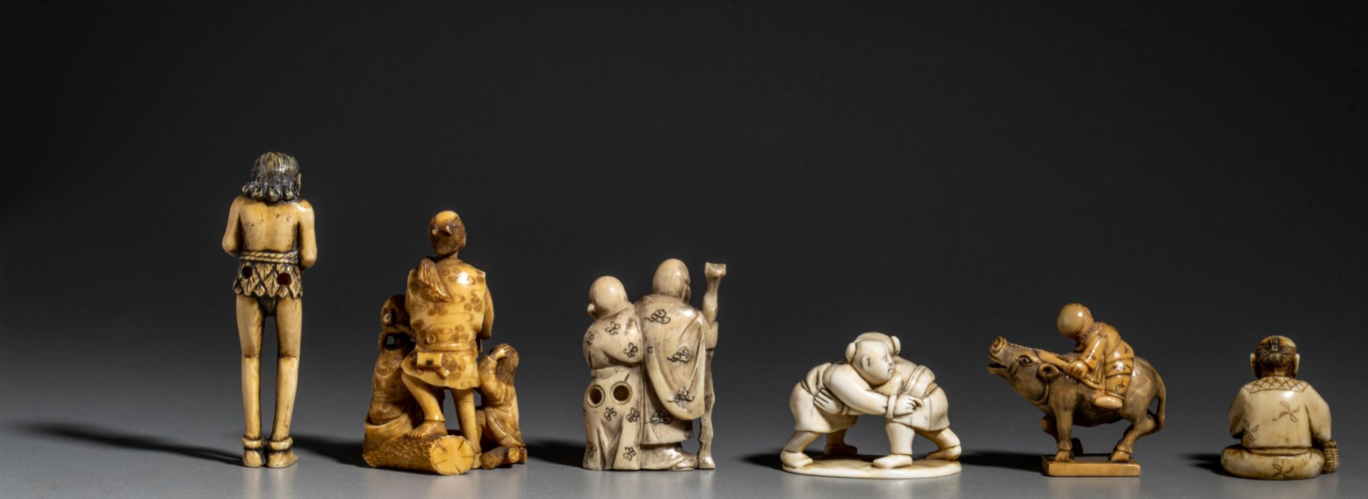 A collection of six ivory Japanese figurines, one okimono and five netsukes (+) - Image 4 of 8