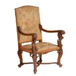 A very fine Renaissance Revival carved walnut armchair, with floral tapestry upholstery, H 124 - W 8