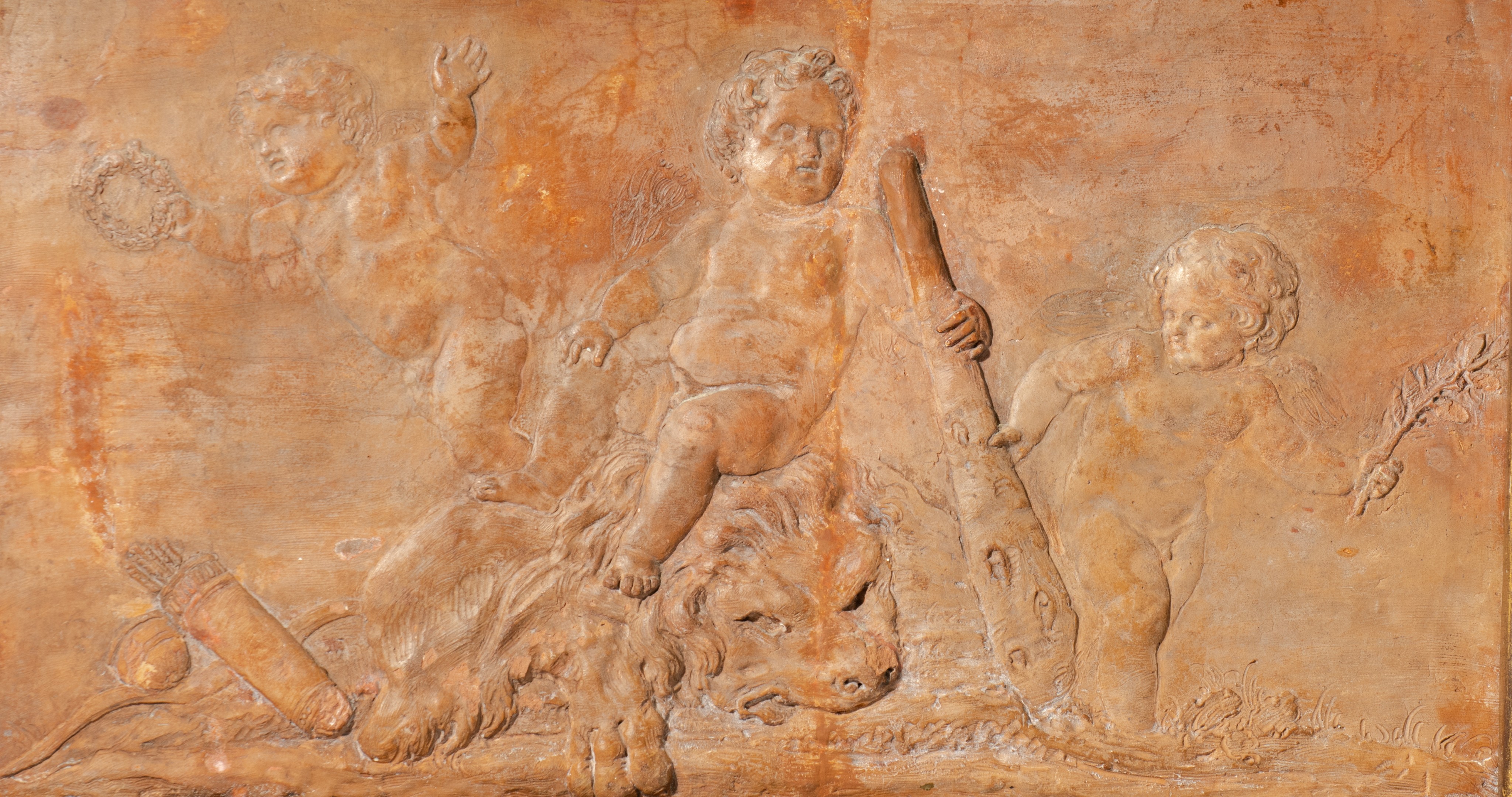 A fine terracotta basso-relievo plaque depicting the young Hercules, 18th/19thC, 31 x 55 cm