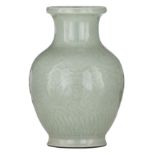 A Chinese incised celadon baluster vase, with a Yongzheng mark, H 29 cm