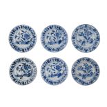 A series of six Chinese Transitional blue and white dishes, dia. 15 cm