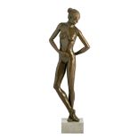 Josyane Vanhoutte (1947), 'Dancer looking at pointed foot', patinated bronze on a blue stone base, H