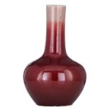 A Chinese sang-de-boeuf glazed bottle vase, late 18thC/ early 19thC, H 36,5 cm