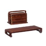 A Chinese hardwood low display stand, H 10,5 - 69 x 27,5 cm - and a Chinese hardwood three-tiered ha