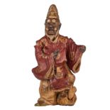 A Japanese stoneware sculpture of a standing man in brown and red glaze, 19thC, H 40 cm