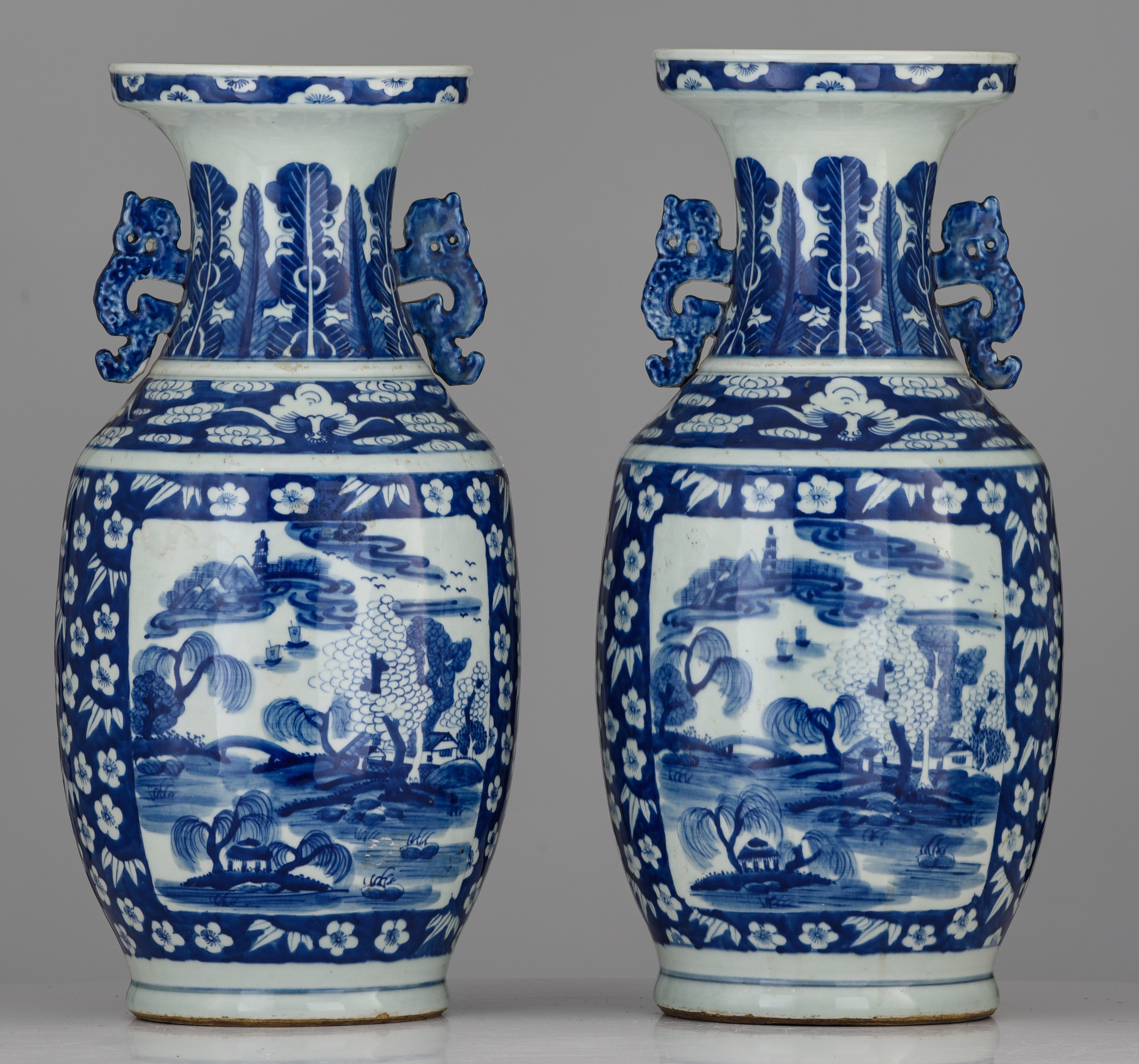 A pair of Chinese blue and white vases, paired with stylised-dragon handles, 19thC, H 49-50 cm - Image 2 of 7