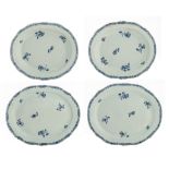 A series of four large Chinese blue and white floral decorated serving plates, 18thC, dia. 33 x 38,5