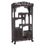 A Chinese carved hardwood cabinet, late Qing, H 177 - W 93 - D 38 cm