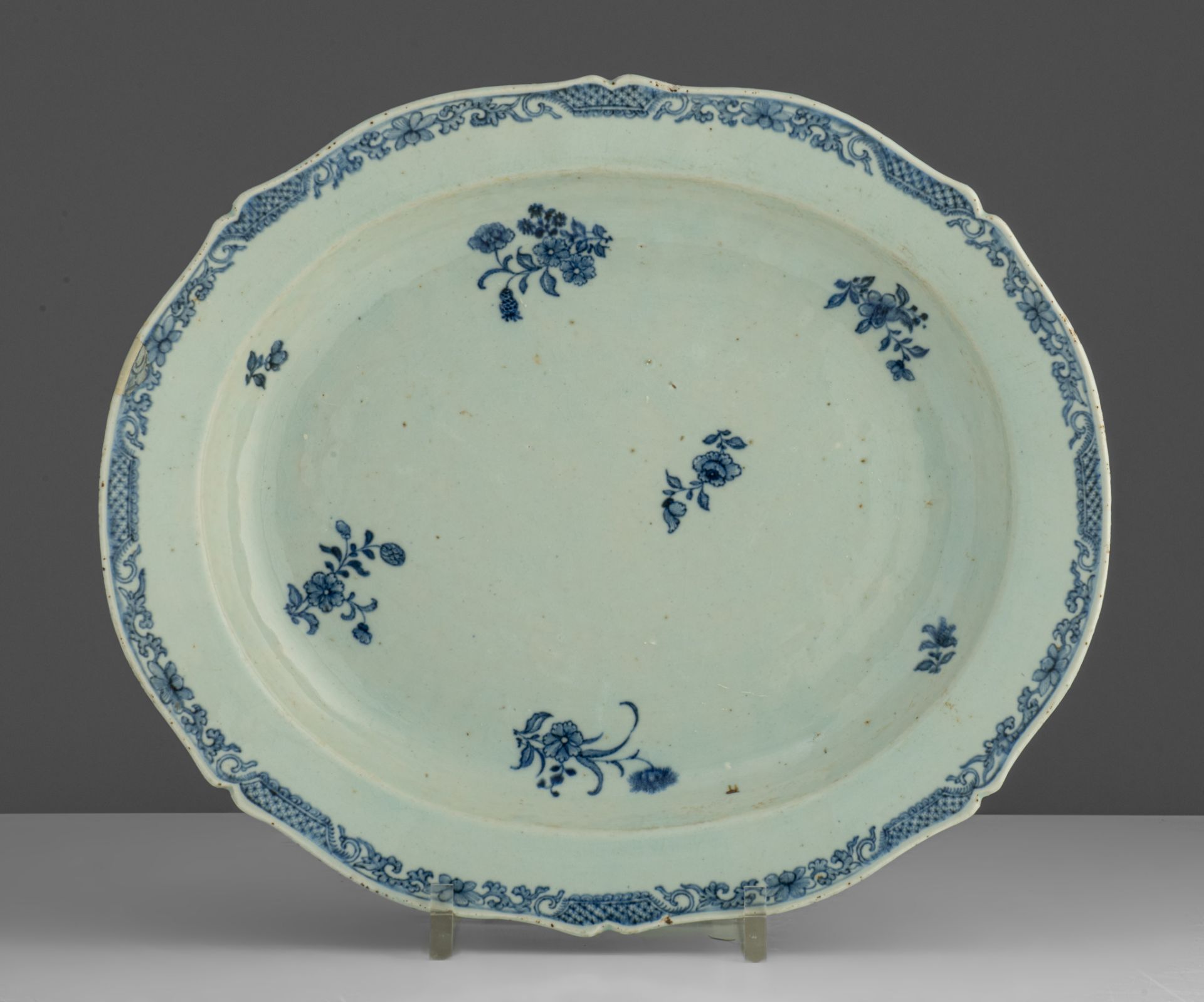 A series of four large Chinese blue and white floral decorated serving plates, 18thC, dia. 33 x 38,5 - Image 8 of 9