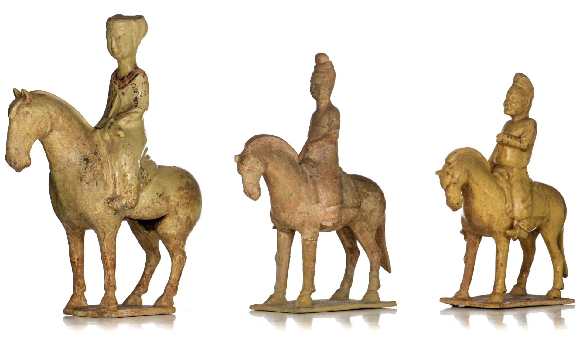 A collection of Chinese (straw-glazed) pottery horses, Sui/Tang-type, tallest H 32 - W 24 cm (3)