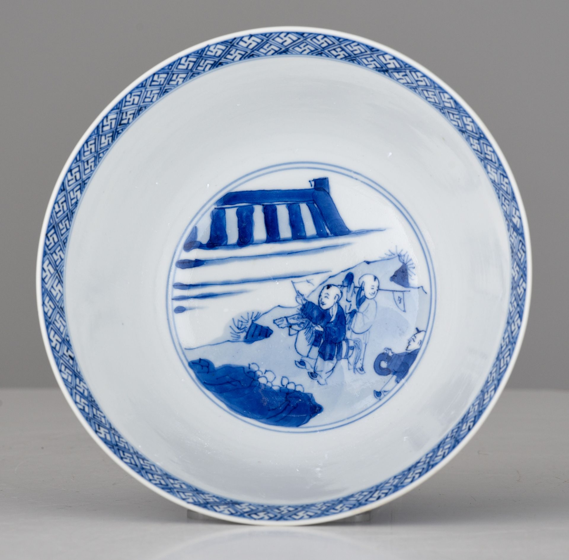 A Chinese blue and white figural bowl, Kangxi mark and of the period, H 7,5 - dia. 16 cm - Image 6 of 7