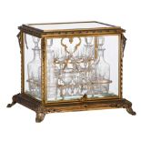 A Napoleon III 'Cave a Liqueur', gilt bronze and etched glass, late 19thC, H 29,5 - W 36 - D 29 cm