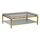 A vintage polished brass and glass coffee table by Maison Jansen, H 40 - W 120 - D 80 cm