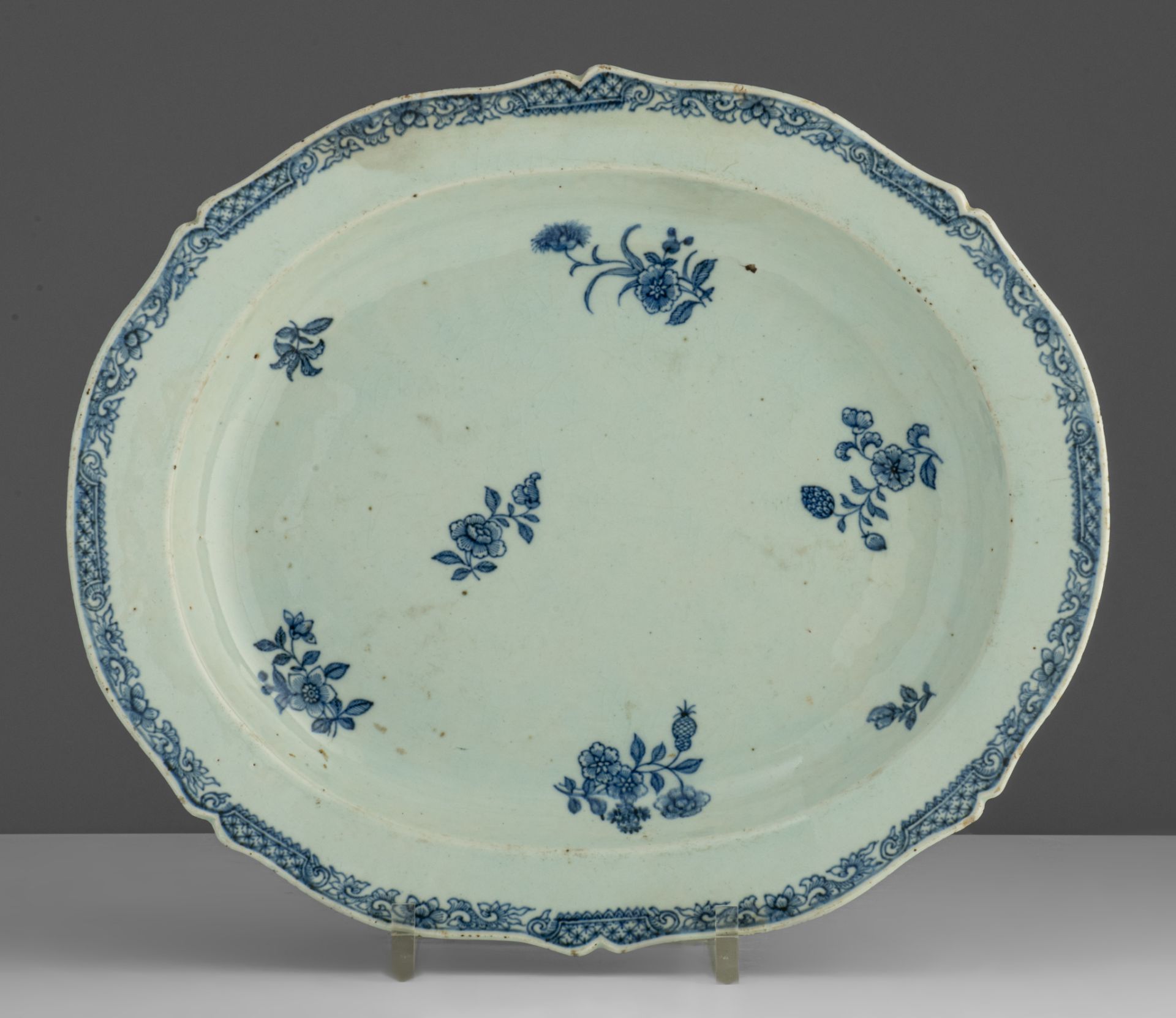 A series of four large Chinese blue and white floral decorated serving plates, 18thC, dia. 33 x 38,5 - Image 6 of 9