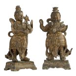 Two gilt-lacquered bronze figures depicting two of the Four Guardian Kings, Ming, Total H 28 - 29 cm