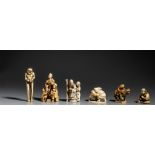 A collection of six ivory Japanese figurines, one okimono and five netsukes (+)