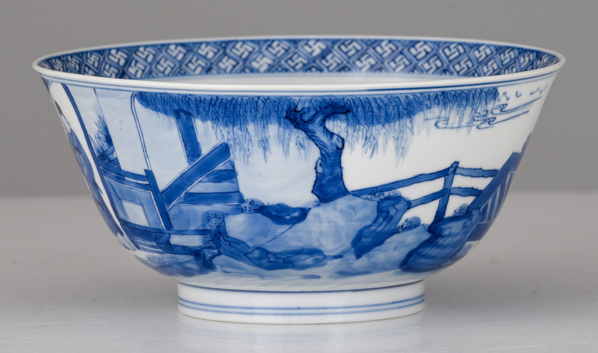 A Chinese blue and white figural bowl, Kangxi mark and of the period, H 7,5 - dia. 16 cm - Image 3 of 7